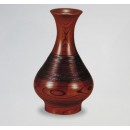 Vase en bois rond