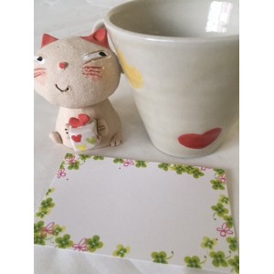 Tasse et chat en céramique assortis